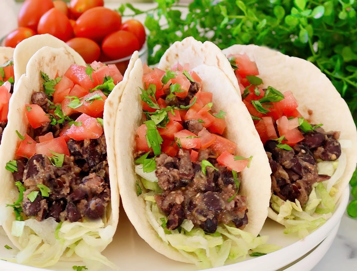 Black Bean Salsa Verde Tacos ~ Quick and easy tacos with hearty black beans, savory seasonings, and smoky green salsa.