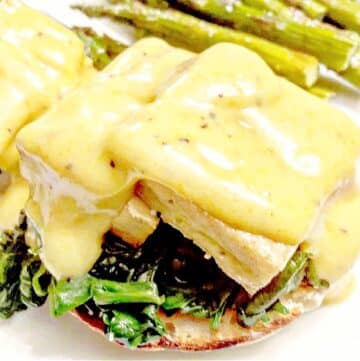 Vegan Tofu Benedict Florentine ~ Baked tofu served over toasted English muffins with sauteed spinach and vegan hollandaise sauce.