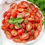 Grape Tomato Salad ~ Garden fresh tomatoes and herbs in a simple vinaigrette. A healthy side dish that highlights flavors of the season.