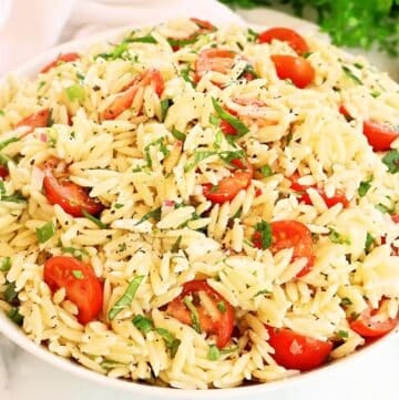 Tomato Orzo Salad ~ Quick and easy pasta salad with garden-fresh tomatoes and herbs in a light lemon dressing.