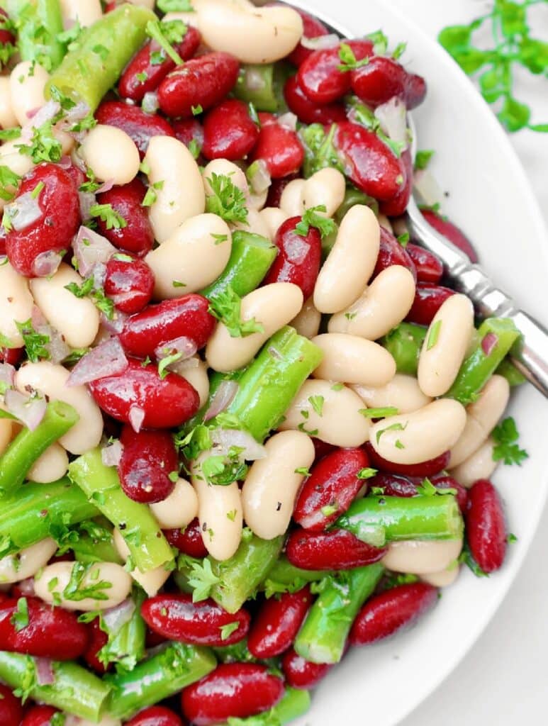 Three Bean Salad ~ A vibrant and refreshing blend of colorful beans tossed in a tangy dressing. A summer favorite!