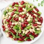 Three Bean Salad ~ A vibrant and refreshing blend of colorful beans tossed in a tangy dressing. A summer favorite!