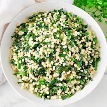 Spinach Couscous ~ An easy and budget-friendly Mediterranean-inspired dish that blends hearty pearl couscous with savory spinach.