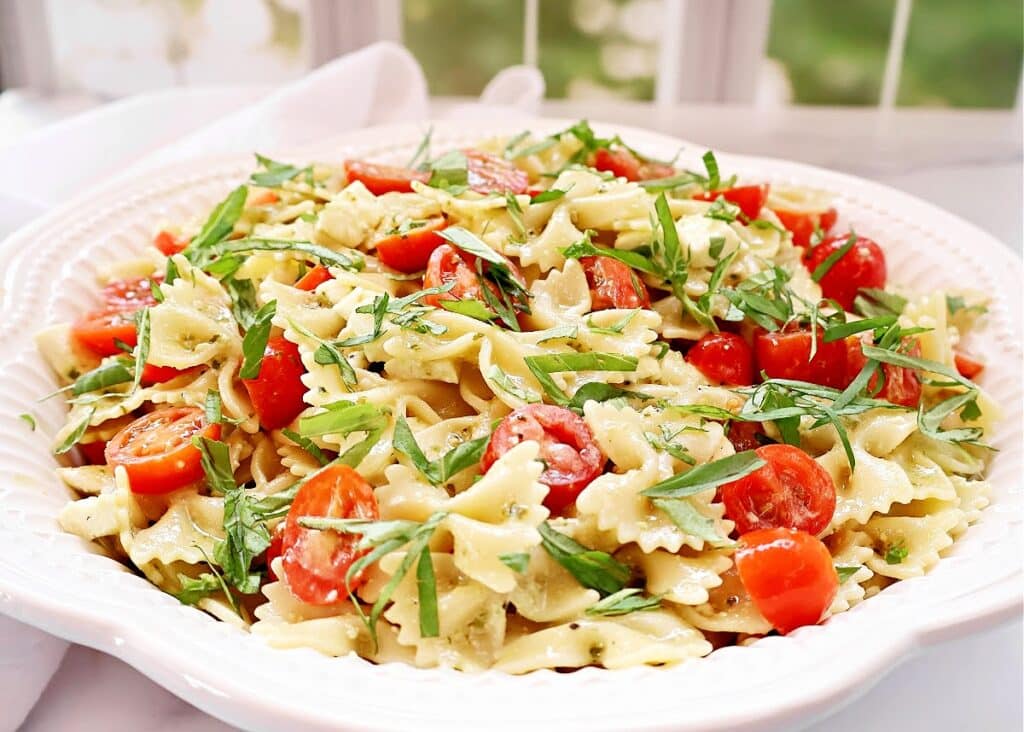 Caprese Pesto Pasta Salad ~ The vibrant flavors of classic Caprese salad in an easy-to-make pasta dish that's always a crowd favorite!