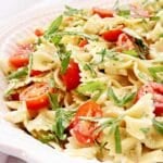 Caprese Pesto Pasta Salad ~ The vibrant flavors of classic Caprese salad in an easy-to-make pasta dish that's always a crowd favorite!