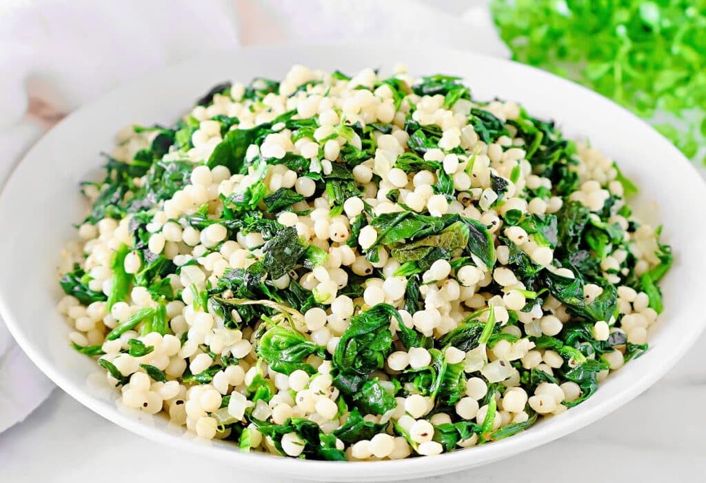 Spinach Couscous ~ An easy and budget-friendly Mediterranean-inspired dish that blends hearty pearl couscous with savory spinach.