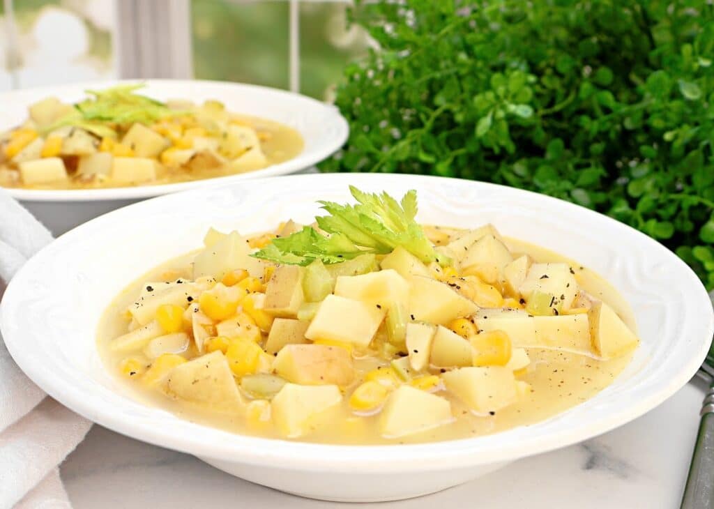 Corn and Potato Soup ~ A quick and hearty soup with tender potatoes, sweet corn, and a rich, flavorful broth. Make it vegetarian or vegan.