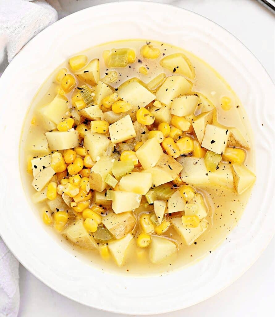 Corn and Potato Soup ~ A quick and hearty soup with tender potatoes, sweet corn, and a rich, flavorful broth. Make it vegetarian or vegan.