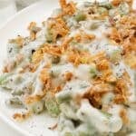 Slow Cooker Green Bean Casserole ~ Tender green beans in a creamy mushroom sauce, topped with crispy fried onions. Easy vegetarian side dish.