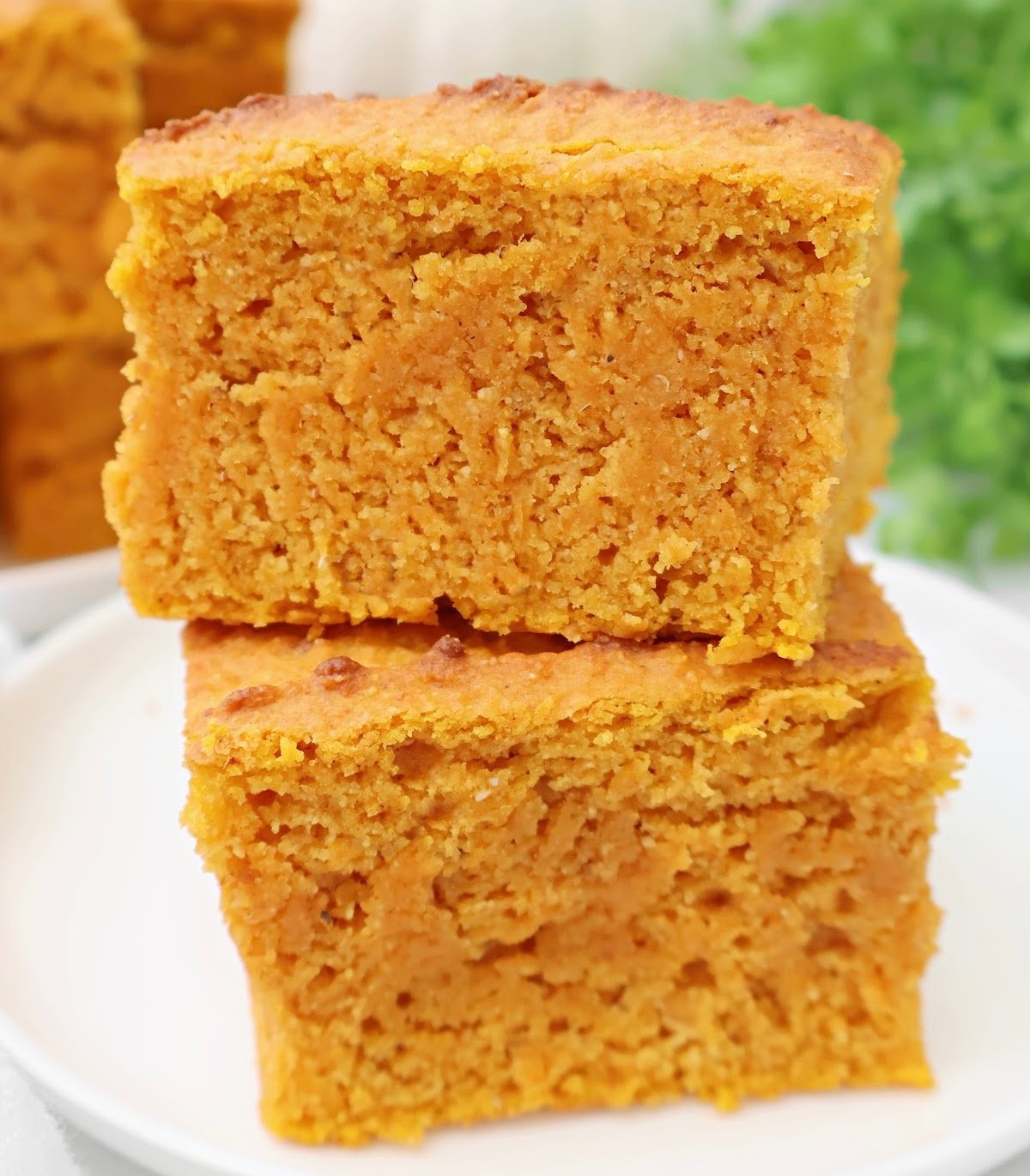 Pumpkin Spice Cornbread ~ Pumpkin cornbread infused with the autumn spices of cinnamon, nutmeg, and cloves. Egg-free recipe.