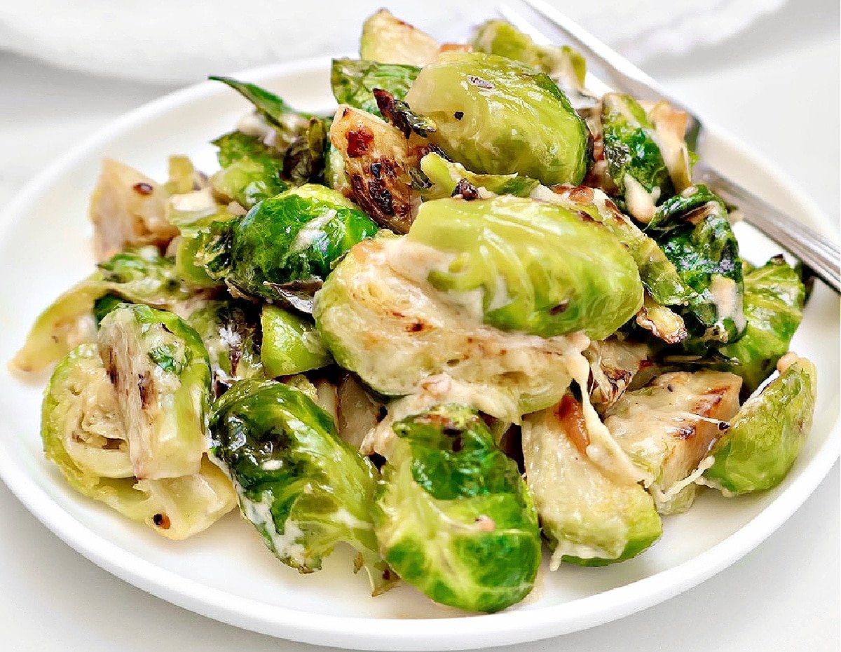 Brussels Sprouts Casserole ~ Savory side dish with fresh Brussels sprouts in a rich and creamy cheese sauce. Vegetarian or Vegan.