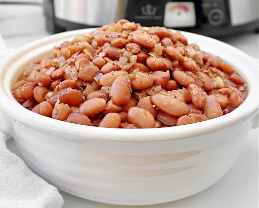 ​Slow Cooker Pinto Beans Recipe ~ Dry pinto beans slow-cooked with warm, aromatic spices. Vegetarian and vegan.