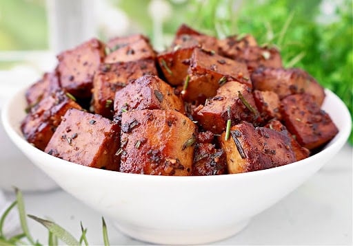 Rosemary Tofu ~ Extra-firm tofu marinated in a savory, tangy rosemary-infused sauce, then pan-fried until lightly crisp. Easy vegan dinner.