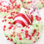 Candy Cane Kiss Cookies ~ Peppermint-infused sugar cookies topped with Hershey's Candy Cane Kisses. Perfect cookie for a cookie exchange!