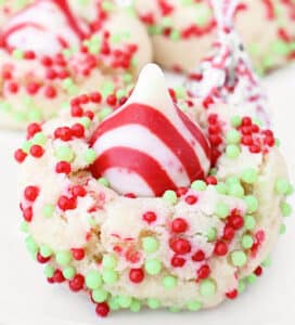 Candy Cane Kiss Cookies ~ Peppermint-infused sugar cookies topped with Hershey's Candy Cane Kisses. Perfect cookie for a cookie exchange!