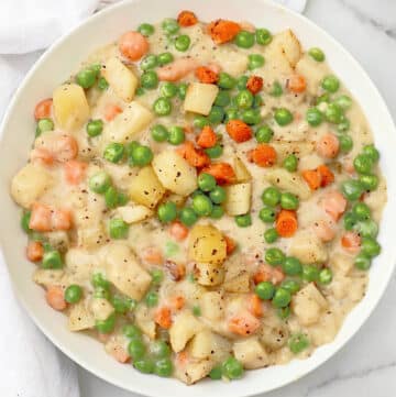 Crustless Veggie Pot Pie ~ All the filling of a classic pot pie with none of the crust! Serve over biscuits for a hearty homestyle dinner.