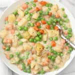 Crustless Veggie Pot Pie ~ All the filling of a classic pot pie with none of the crust! Serve over biscuits for a hearty homestyle dinner.