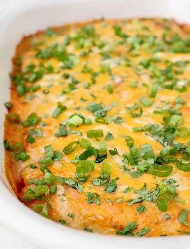 Tamale Casserole ~ Easy and comforting Tex-Mex dish made with your favorite premade tamales and a rich, cheesy sauce.