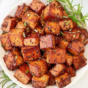 Rosemary Tofu ~ Extra-firm tofu marinated in a savory, tangy rosemary-infused sauce, then pan-fried until lightly crisp. Easy vegan dinner.