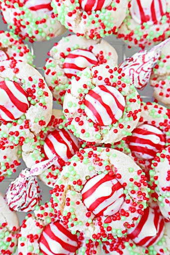 Candy Cane Kiss Cookies ~ Peppermint-infused sugar cookies topped with Hershey's Candy Cane Kisses. Perfect cookie for a cookie exchange!