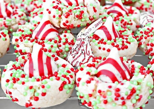 Candy Cane Kiss Cookies ~ Peppermint-infused sugar cookies topped with Hershey's Candy Cane Kisses. Perfect cookie for a cookie exchange!