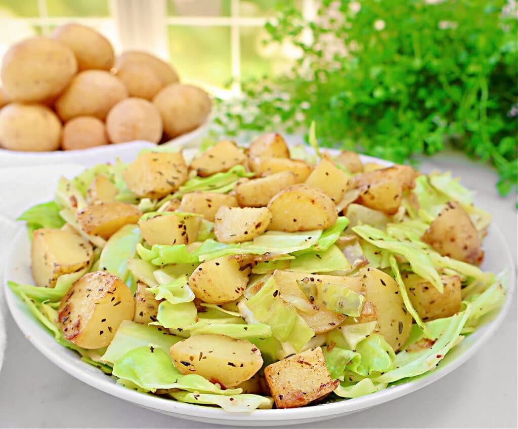 Potatoes and Cabbage ~ Green cabbage sauteed with Yukon Gold potatoes and savory seasonings.