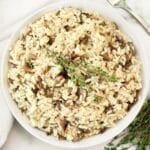 Mushroom Risotto ~ Creamy risotto with the rustic flavors of cremini mushrooms and fresh thyme. Serve as a main course or hearty side dish. Vegetarian or Vegan.