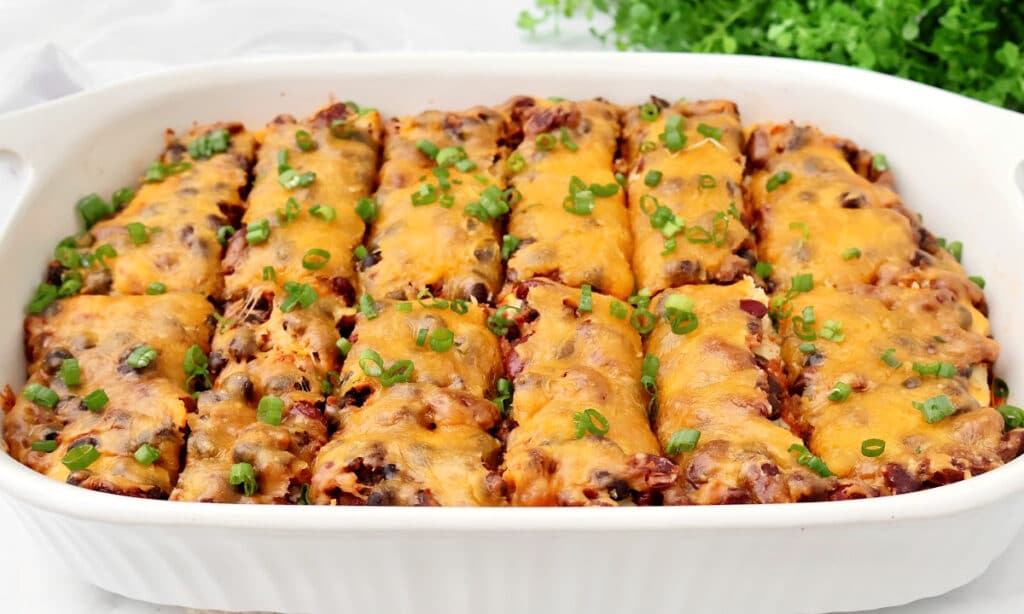 Chili Tamale Casserole ~ Easy Tex-Mex bake with premade tamales, chili, and cheese. A dinner saver on a busy weeknight!