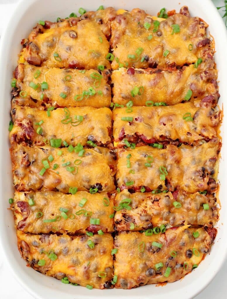 Chili Tamale Casserole ~ Easy Tex-Mex bake with premade tamales, chili, and cheese. A dinner saver on a busy weeknight!