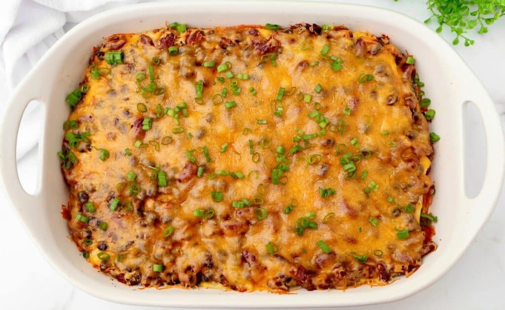 Chili Tamale Casserole ~ Easy Tex-Mex bake with premade tamales, chili, and cheese. A dinner saver on a busy weeknight!