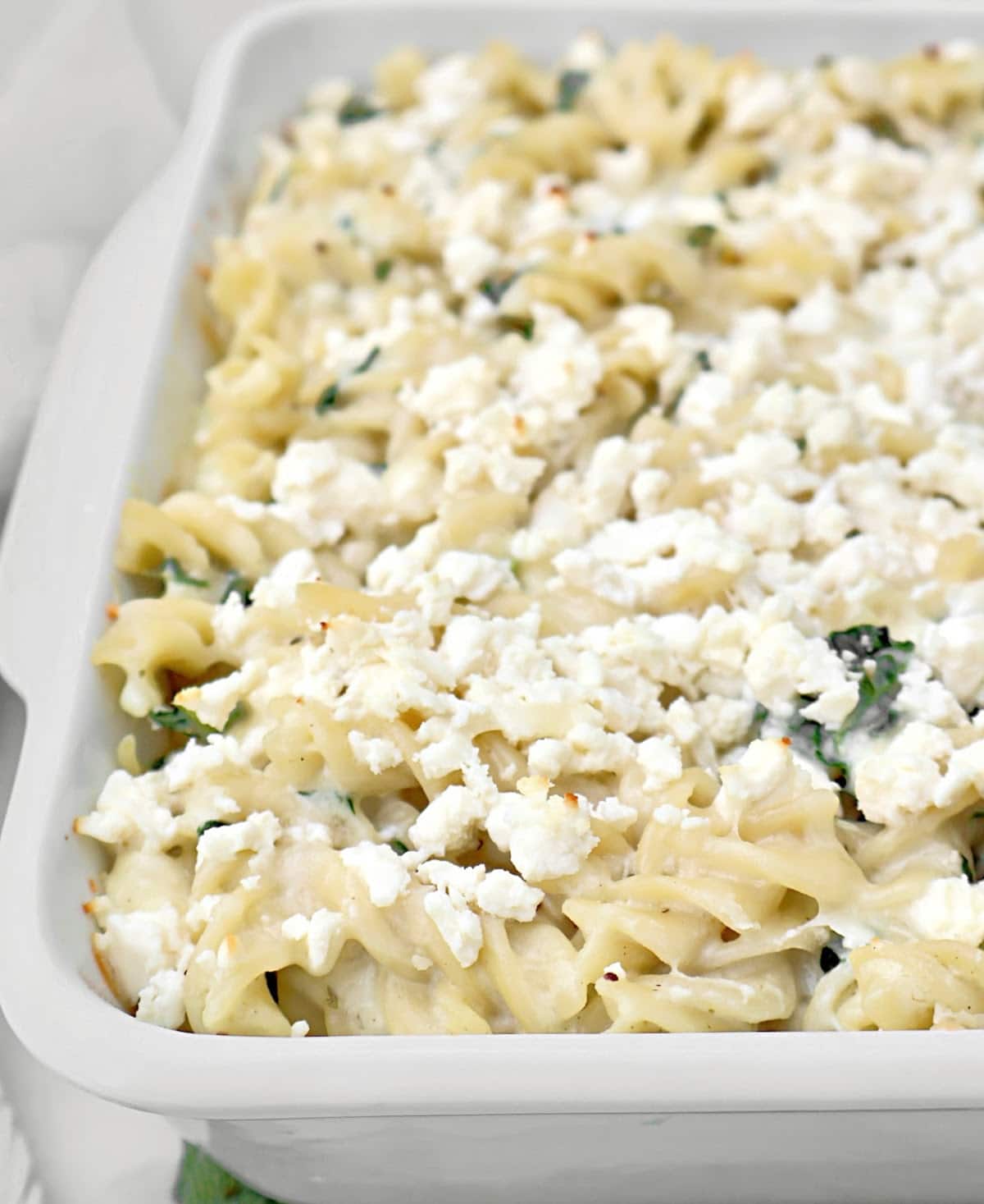 Cheesy Kale Pasta Bake ~ Tender pasta tossed with a creamy three-cheese sauce and fresh kale for an easy and comforting casserole.