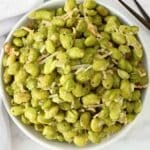 Roasted Edamame with Parmesan ~ Edamame beans coated in a savory blend of Parmesan, garlic, and olive oil, then roasted to perfection.