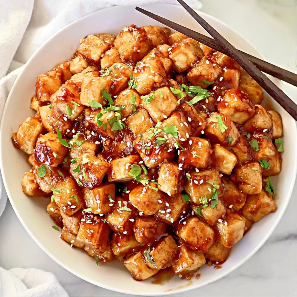 Teriyaki Tofu ~ Crispy tofu coated in a savory and slightly sweet homemade teriyaki sauce. Easy vegan and vegetarian dinner.