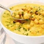 Chickpea Curry Soup ~ Protein-packed chickpeas (garbanzo beans) and warm spices in a comforting soup. Ready in 20 minutes. Vegetarian and Vegan.