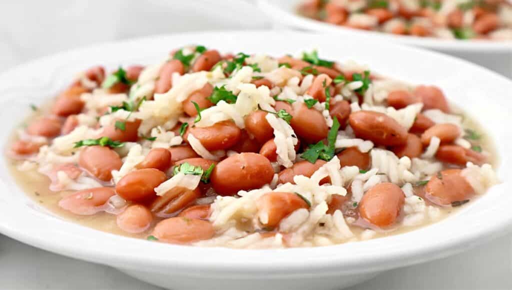 Pinto Bean and Rice Soup ~ Simple and satisfying, this soup combines tender beans, fluffy rice, and fragrant herbs for a cozy meal.