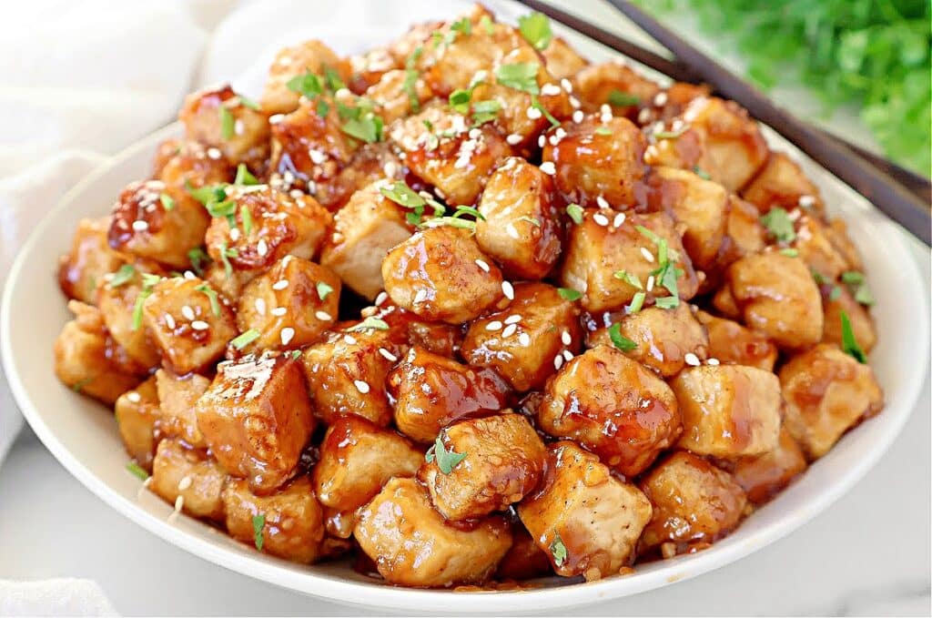 Teriyaki Tofu ~ Crispy tofu coated in a savory and slightly sweet homemade teriyaki sauce. Easy vegan and vegetarian dinner.