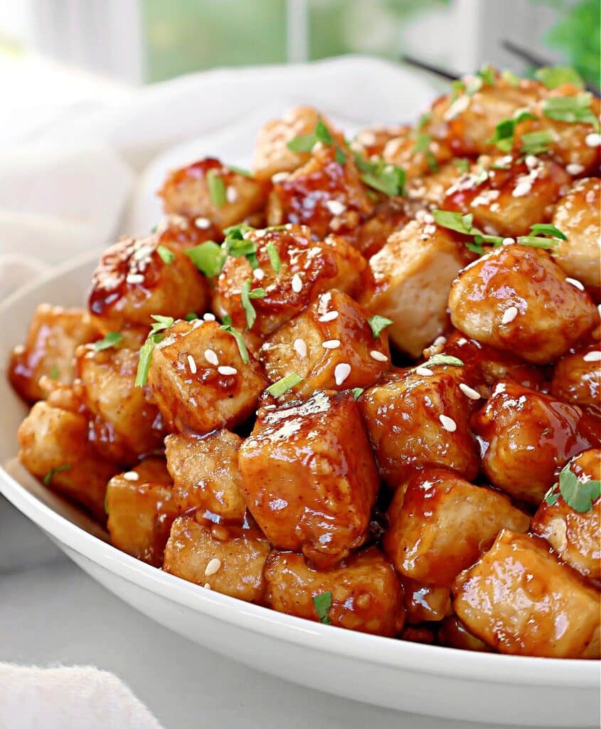 Teriyaki Tofu ~ Crispy tofu coated in a savory and slightly sweet homemade teriyaki sauce. Easy vegan and vegetarian dinner.