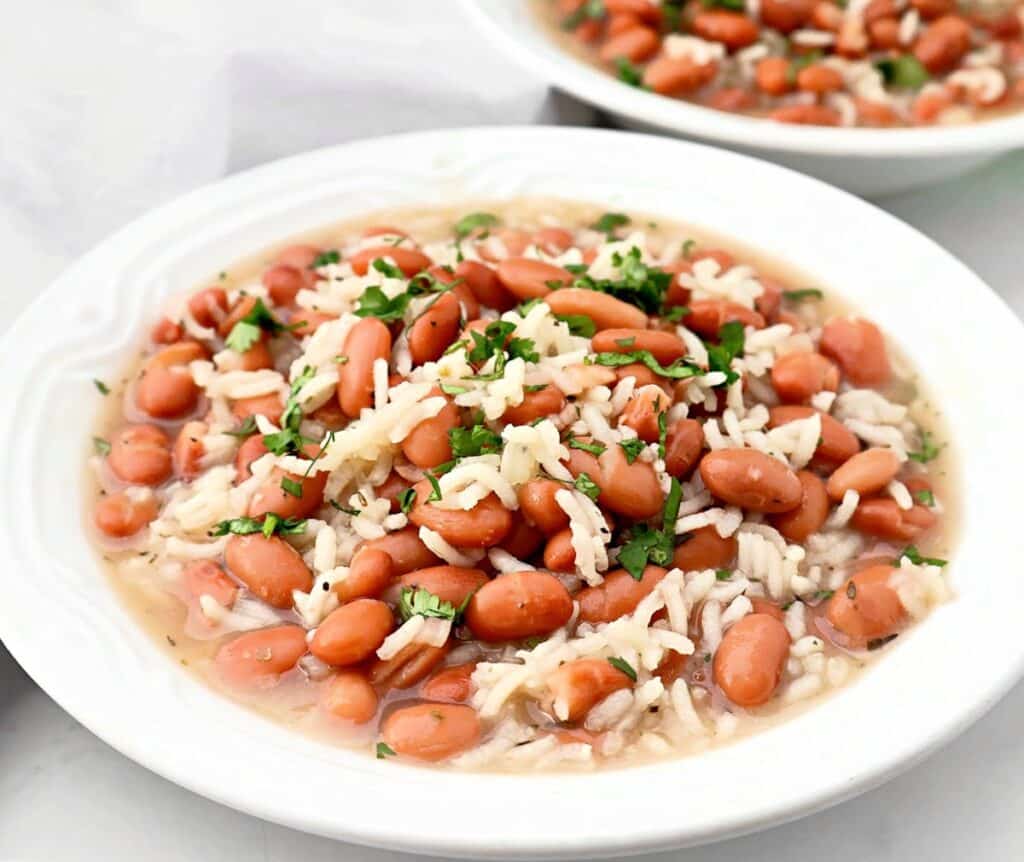 Pinto Bean and Rice Soup ~ Simple and satisfying, this soup combines tender beans, fluffy rice, and fragrant herbs for a cozy meal.