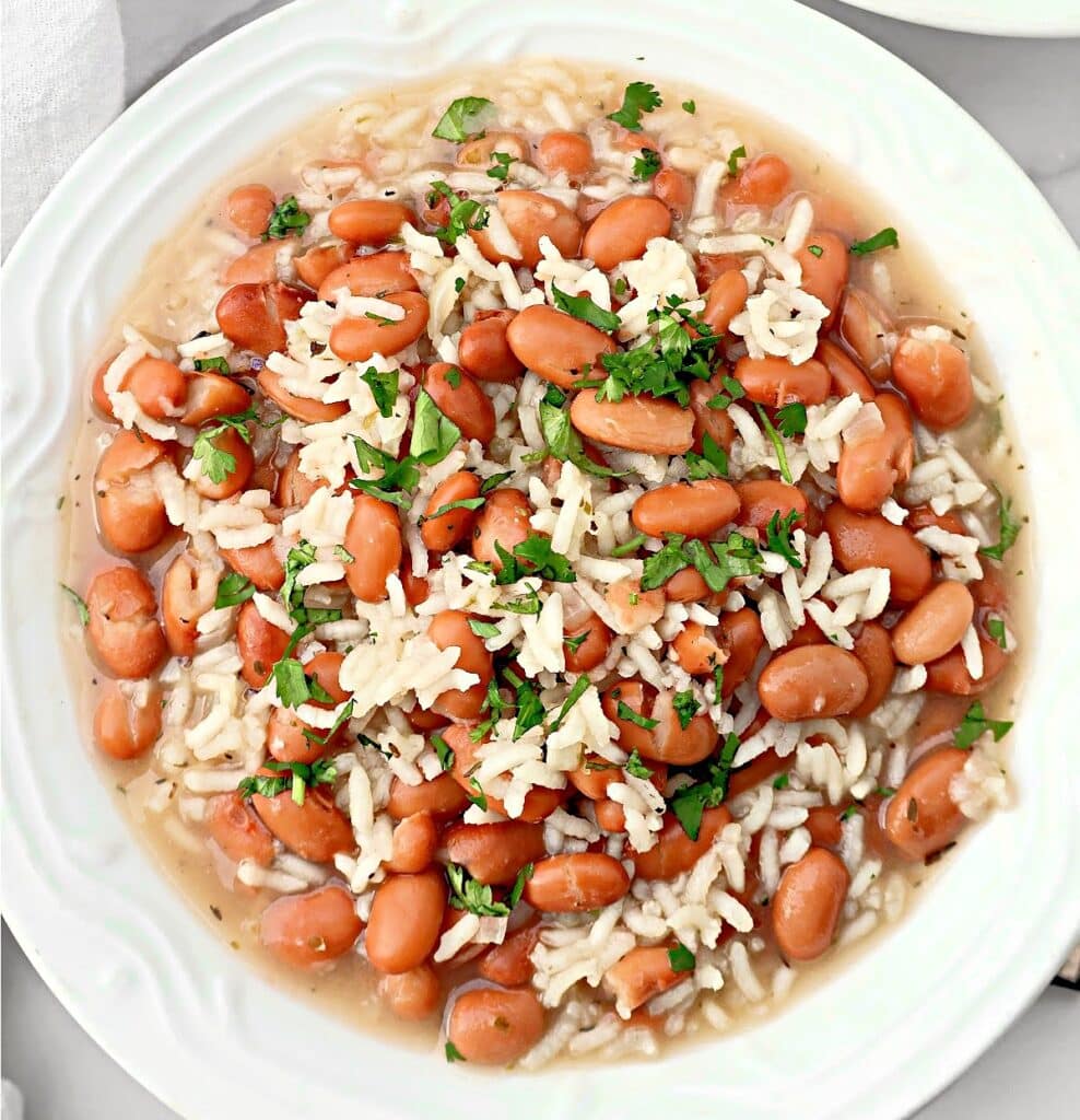 Pinto Bean and Rice Soup ~ Simple and satisfying, this soup combines tender beans, fluffy rice, and fragrant herbs for a cozy meal.