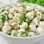 Marinated Mozzarella Balls ~ Fresh mozzarella pearls marinated in a blend of olive oil, herbs, and garlic.