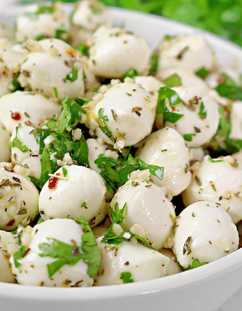 Marinated Mozzarella Balls ~ Fresh mozzarella pearls marinated in a blend of olive oil, herbs, and garlic.