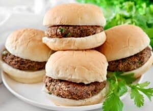 Black Bean Sliders ~ Made with fresh ingredients and pantry staples, these plant-based mini burgers come together in under 30 minutes!