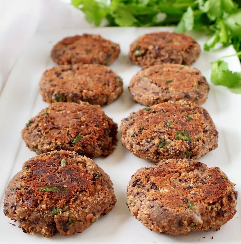 Black Bean Sliders ~ Made with fresh ingredients and pantry staples, these mini plant-based burgers come together in under 30 minutes!