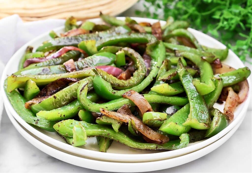 Mexican Peppers and Onions ~ Charred bell peppers and sweet onions seasoned with Mexican oregano and garlic salt - perfect for fajitas or burrito bowls!