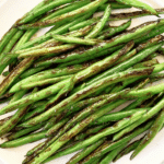 Blistered Green Beans ~ Chinese-style recipe featuring fresh green beans pan-seared with garlic and soy sauce.