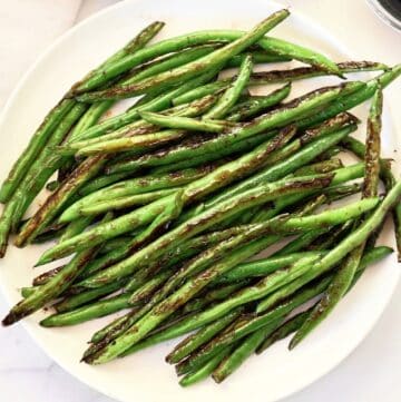 Blistered Green Beans ~ Chinese-style recipe featuring fresh green beans pan-seared with garlic and soy sauce.