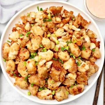 Crispy Bang Bang Cauliflower tossed in a bold, sweet, and spicy sauce. A restaurant-style dish made easy at home!