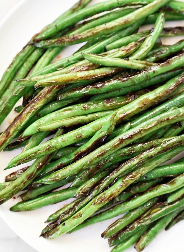 Blistered Green Beans ~ Chinese-style recipe featuring fresh green beans pan-seared with garlic and soy sauce.