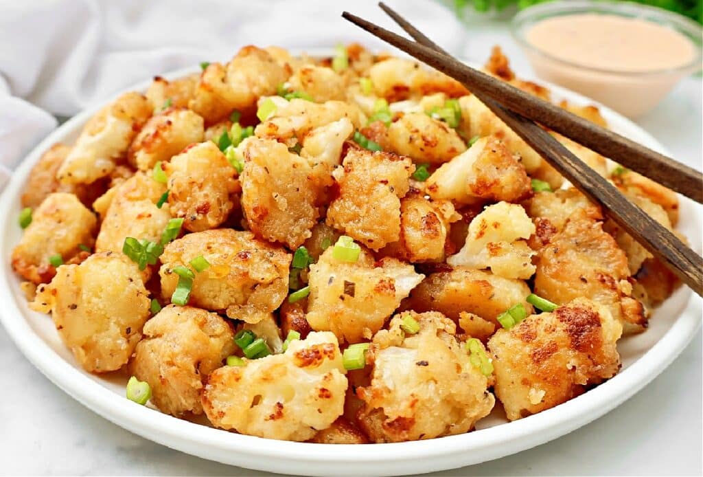 Crispy Bang Bang Cauliflower tossed in a bold, sweet, and spicy sauce. A restaurant-style dish made easy at home!