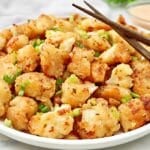 Crispy Bang Bang Cauliflower tossed in a bold, sweet, and spicy sauce. A restaurant-style dish made easy at home!